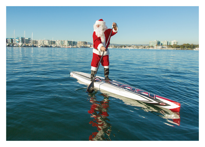 day care santa paddle boarding santa tag palm press day care santa paddle boarding santa tag palm press